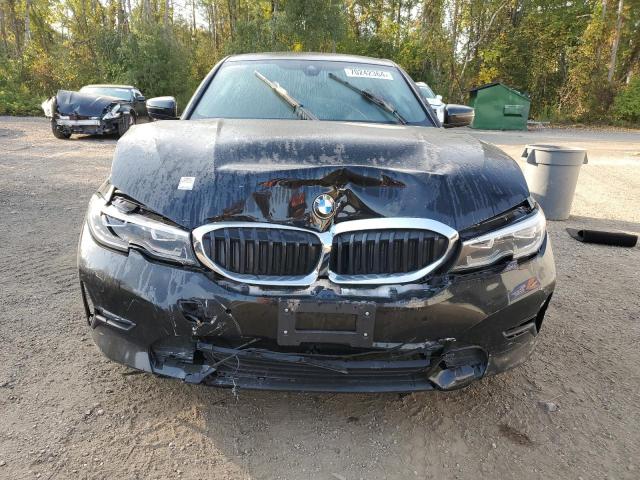 Photo 5 from auction – 2022 BMW 330XI with VIN 3MW5R7J06N8C73442
