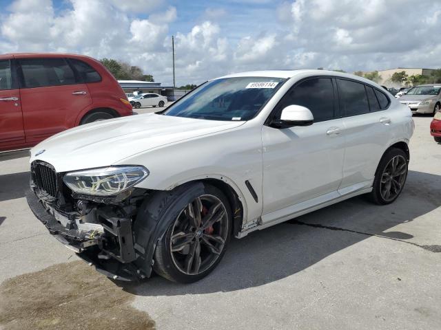BMW X4 XDRIVEM 2021 with VIN 5UX2V5C09M9E99886 - Photo from auction