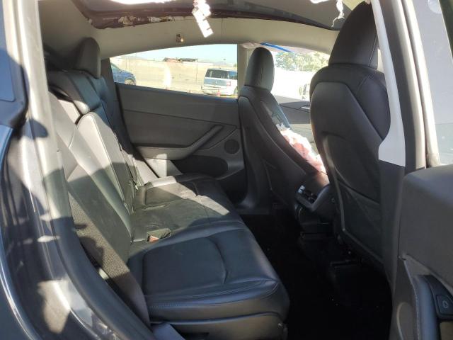 Photo 11 from auction – 2023 TESLA MODEL Y with VIN 7SAYGAEE0PF980580