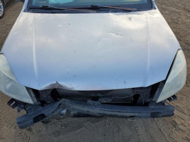 Photo 11 from auction – 2006 KIA RIO with VIN KNADE123766131171