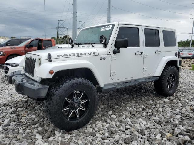 JEEP WRANGLER U 2011 with VIN 1J4HA3H15BL625715 - Photo from auction