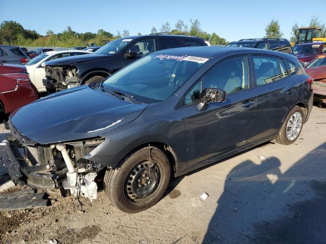 SUBARU IMPREZA 2018 with VIN 4S3GTAA69J3752603 - Photo from auction