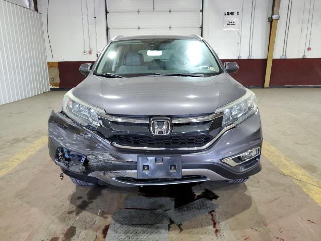 Photo 5 from auction – 2015 HONDA CR-V EXL with VIN 5J6RM4H79FL134740