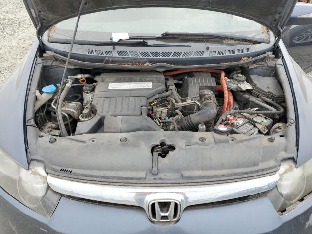 Photo 11 from auction – 2006 HONDA CIVIC HYBR with VIN JHMFA36296S025654