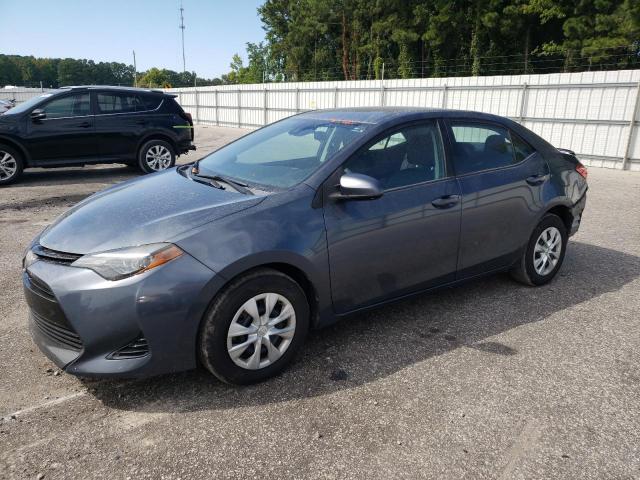TOYOTA COROLLA LE 2018 with VIN 5YFBPRHE4JP822977 - Photo from auction
