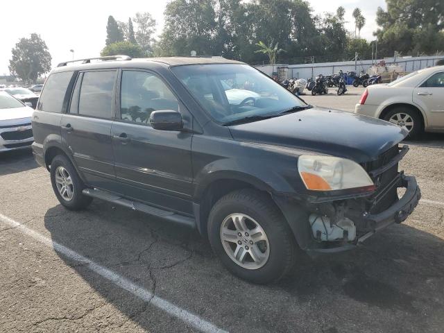 Foto 4 de la subasta – 2003 HONDA PILOT EX con VIN 2HKYF18403H551857