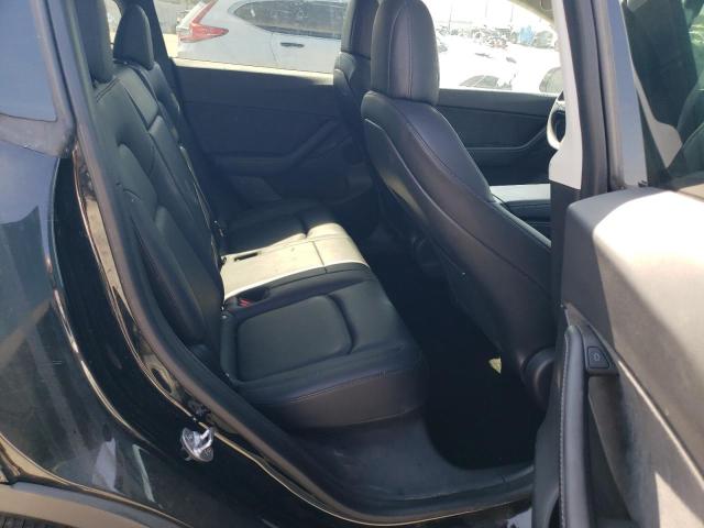 Photo 11 from auction – 2022 TESLA MODEL Y with VIN 7SAYGDEEXNF351200