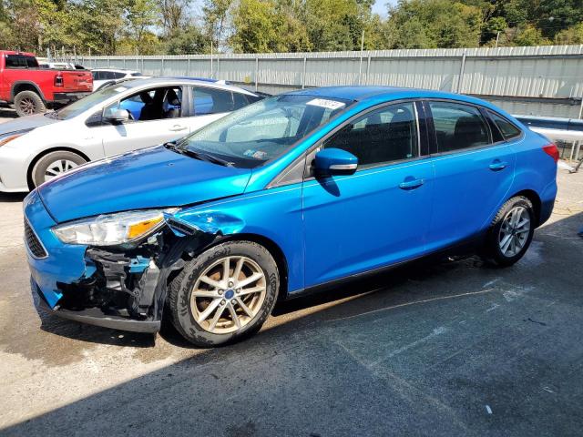 FORD FOCUS SE 2017 with VIN 1FADP3F21HL209304 - Photo from auction