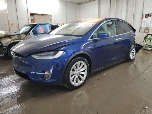 TESLA MODEL X 2020 with VIN 5YJXCDE22LF306226 - Photo from auction