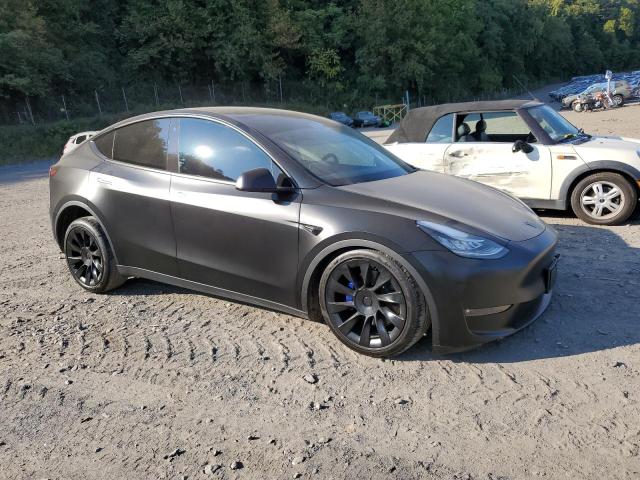 Photo 4 from auction – 2023 TESLA MODEL Y with VIN 7SAYGDEE8PF602329