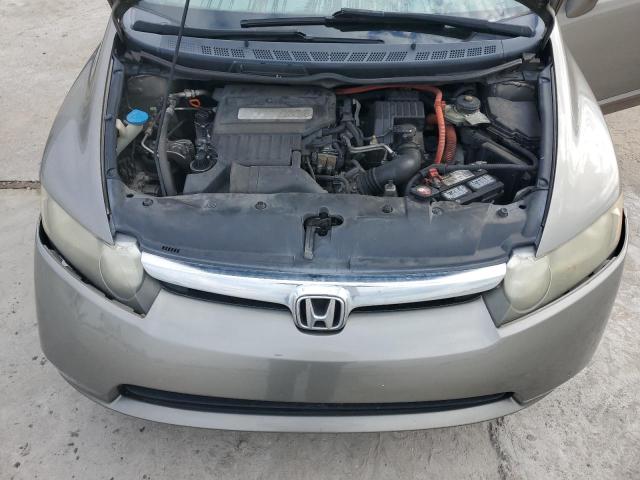 Photo 11 from auction – 2006 HONDA CIVIC HYBR with VIN JHMFA36216S025454