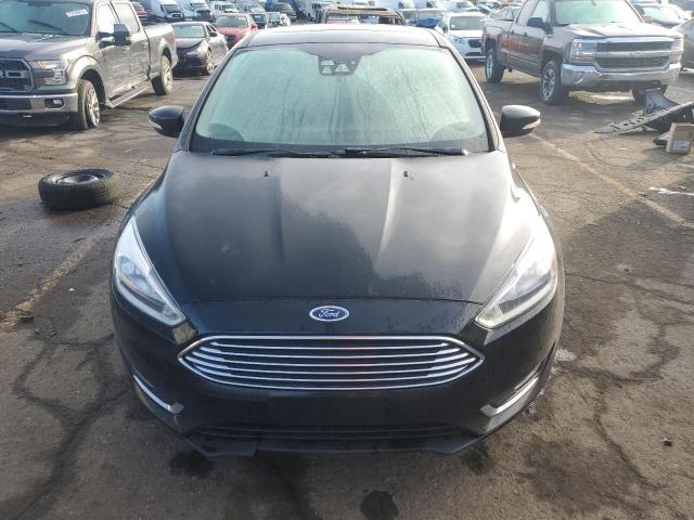 Photo 5 from auction – 2015 FORD FOCUS TITA with VIN 1FADP3J21FL201031