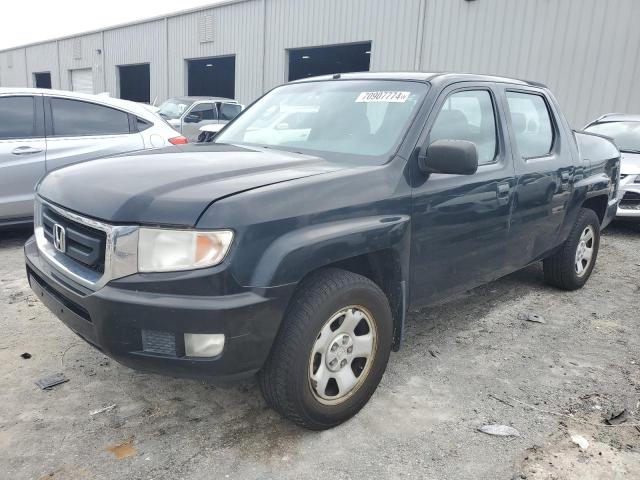 HONDA RIDGELINE 2011 with VIN 5FPYK1F23BB009542 - Photo from auction