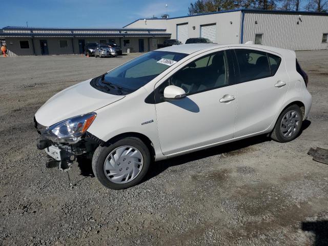 TOYOTA PRIUS C 2015 with VIN JTDKDTB39F1093027 - Photo from auction