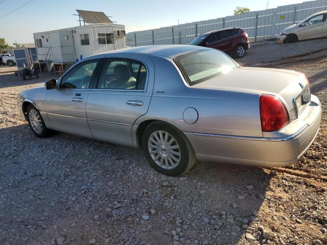 Photo 2 from auction – 2003 LINCOLN TOWN CAR E with VIN 1LNHM81W63Y667147