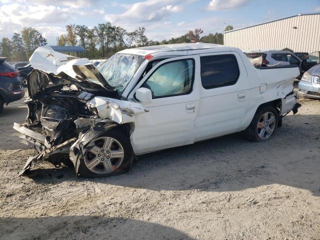 HONDA RIDGELINE 2011 with VIN 5FPYK1F57BB010509 - Photo from auction