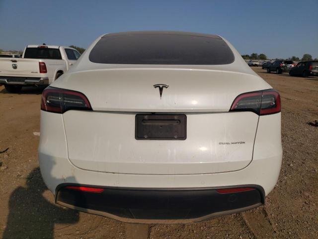 Photo 6 from auction – 2022 TESLA MODEL Y with VIN 7SAYGAEE2NF383055