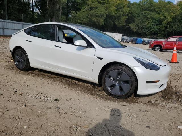 Photo 4 from auction – 2022 TESLA MODEL 3 with VIN 5YJ3E1EA1NF104124