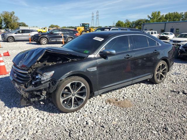 FORD TAURUS 2014 with VIN 1FAHP2F84EG138684 - Photo from auction