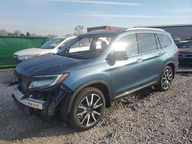 HONDA PILOT TOUR 2019 with VIN 5FNYF5H97KB044745 - Photo from auction