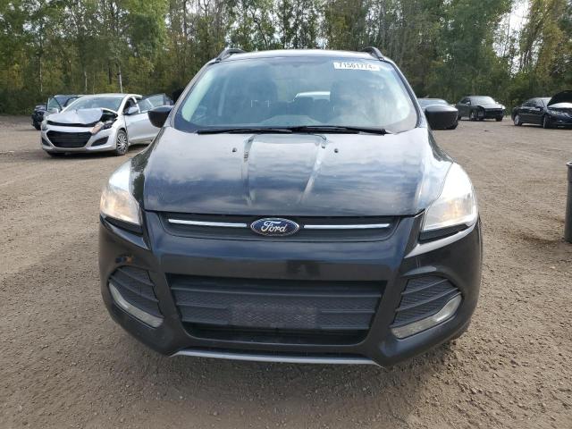 Photo 5 from auction – 2014 FORD ESCAPE SE with VIN 1FMCU0G90EUC61811