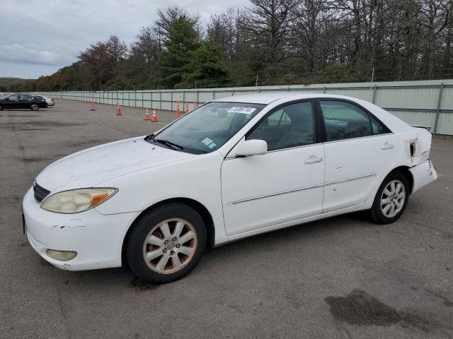 TOYOTA CAMRY LE 2003 with VIN 4T1BE30K73U129200 - Photo from auction