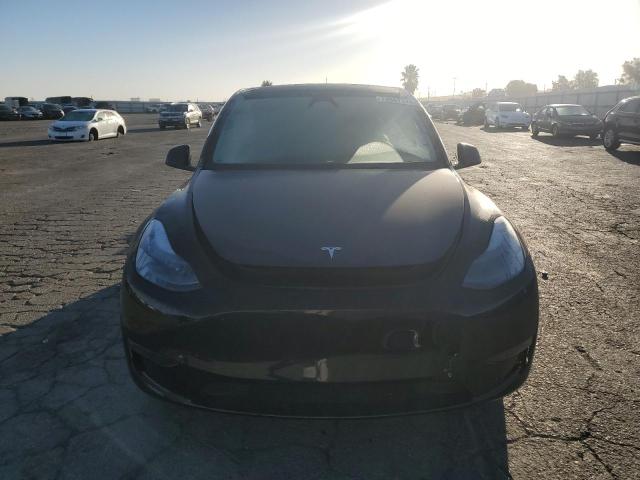 Photo 5 from auction – 2023 TESLA MODEL Y with VIN 7SAYGDEE1PF827580