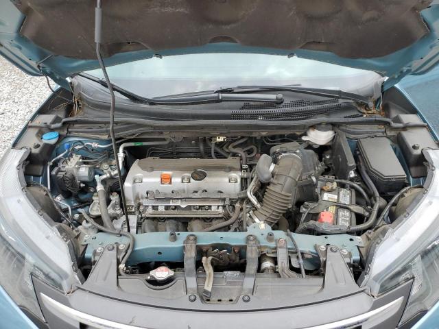 Photo 12 from auction – 2014 HONDA CR-V LX with VIN 2HKRM3H32EH560348