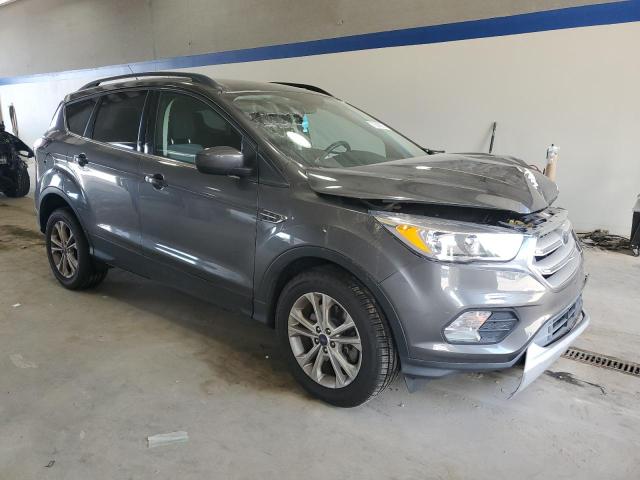Photo 4 from auction – 2018 FORD ESCAPE SE with VIN 1FMCU9GD9JUA55566