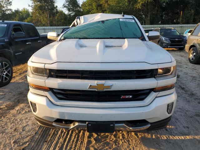 Photo 5 from auction – 2018 CHEVROLET SILVERADO with VIN 3GCUKREC4JG222167