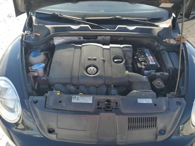 Photo 11 from auction – 2014 VOLKSWAGEN BEETLE with VIN 3VWFP7AT8EM625299