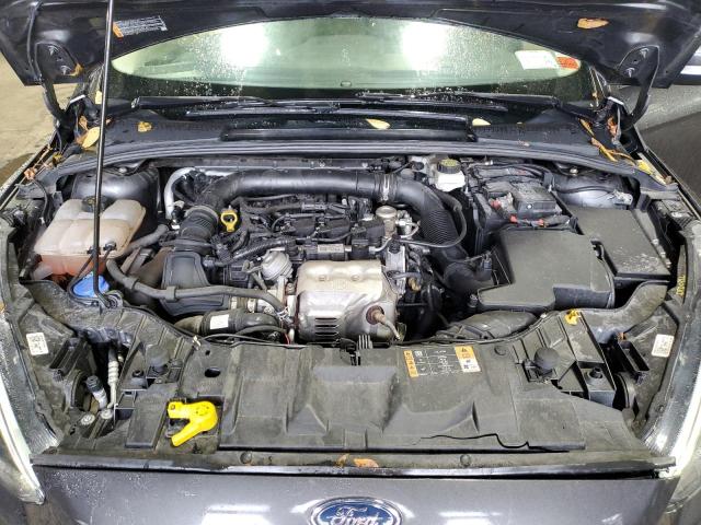 Фото 11 с аукциона – 2018 FORD FOCUS SE с VIN 1FADP3FEXJL237585