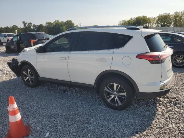 Photo 2 from auction – 2017 TOYOTA RAV4 XLE with VIN JTMWFREV6HD095881