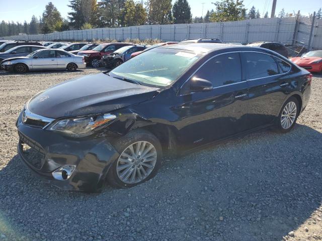 TOYOTA AVALON HYB 2014 with VIN 4T1BD1EBXEU023861 - Photo from auction