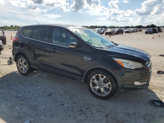 Photo 4 from auction – 2013 FORD ESCAPE SEL with VIN 1FMCU0H97DUC08889