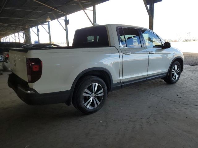 Photo 3 from auction – 2017 HONDA RIDGELINE with VIN 5FPYK2F44HB009047