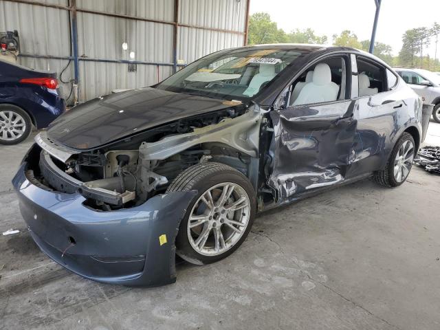 TESLA MODEL Y 2023 with VIN 7SAYGDEE3PF611553 - Photo from auction
