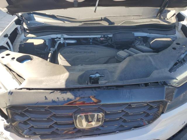 Photo 12 from auction – 2022 HONDA PASSPORT E with VIN 5FNYF8H04NB006462