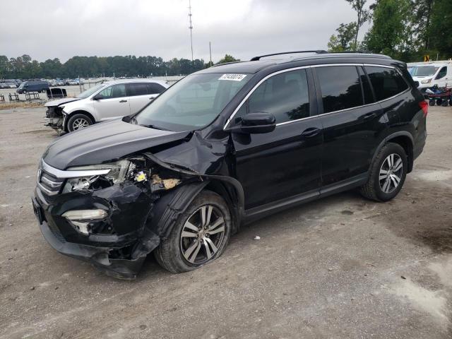 HONDA PILOT EXL 2016 with VIN 5FNYF6H58GB123142 - Photo from auction