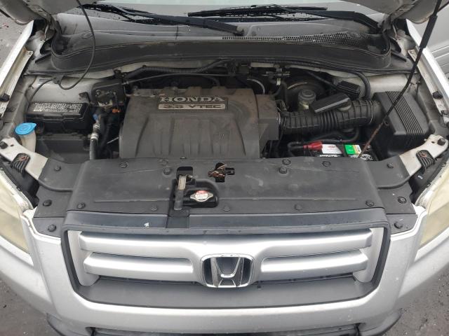 Photo 12 from auction – 2006 HONDA PILOT LX with VIN 5FNYF18136B023626