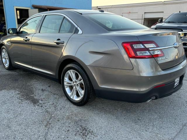 Photo 3 from auction – 2014 FORD TAURUS SEL with VIN 1FAHP2E83EG149273