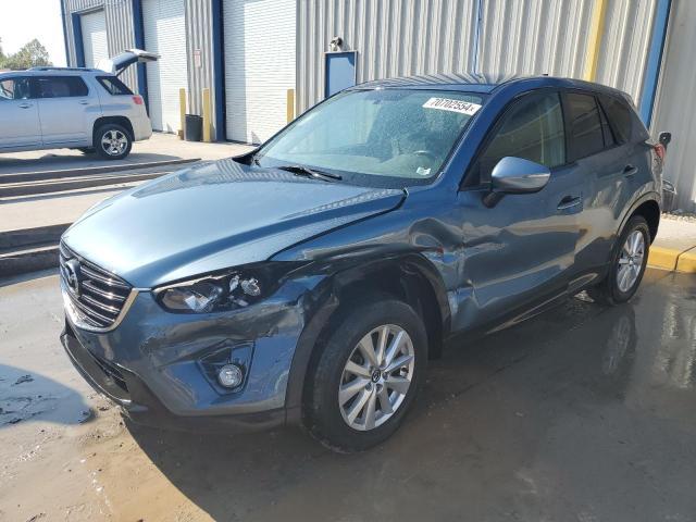 MAZDA CX-5 TOURI 2016 with VIN JM3KE4CY4G0646646 - Photo from auction