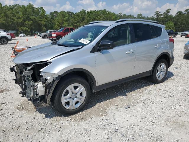 TOYOTA RAV4 LE 2014 with VIN JTMZFREV7E5018682 - Photo from auction