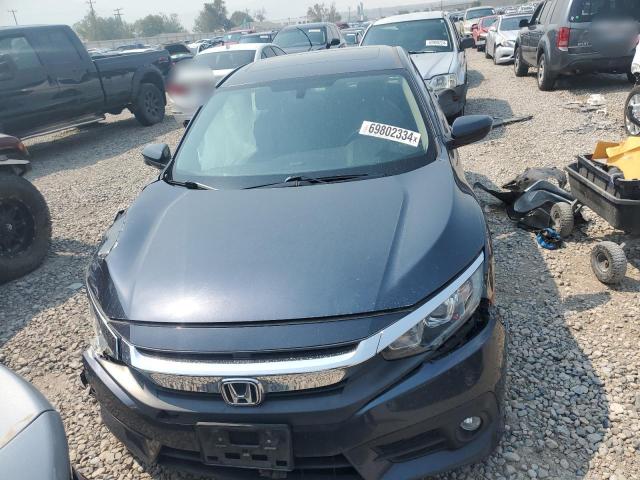 Photo 5 from auction – 2018 HONDA CIVIC EX with VIN JHMFC1F3XJX021664