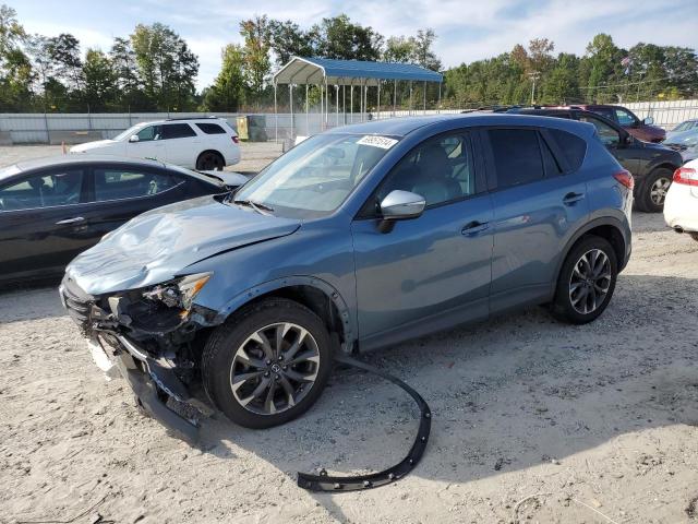 MAZDA CX-5 GT 2016 with VIN JM3KE2DY4G0767647 - Photo from auction