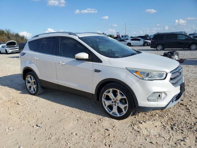 Photo 4 from auction – 2017 FORD ESCAPE TIT with VIN 1FMCU0J90HUA93598