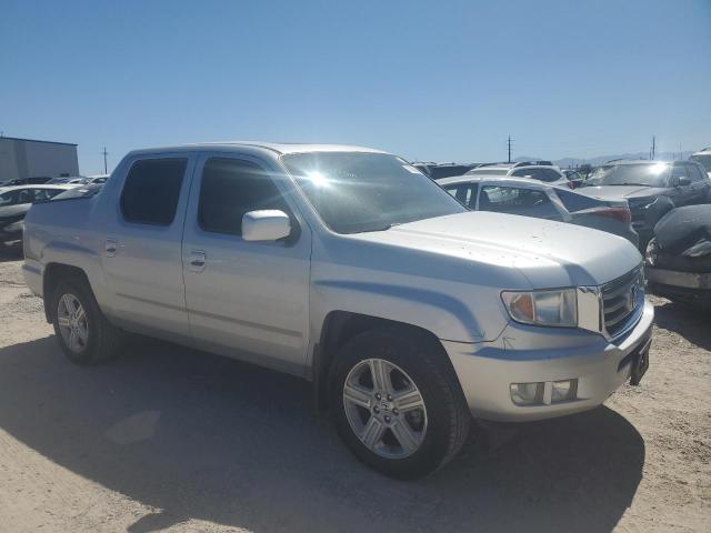 Photo 4 from auction – 2014 HONDA RIDGELINE with VIN 5FPYK1F56EB012997