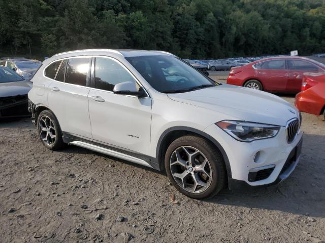 Photo 4 from auction – 2016 BMW X1 XDRIVE2 with VIN WBXHT3C30G5E54205