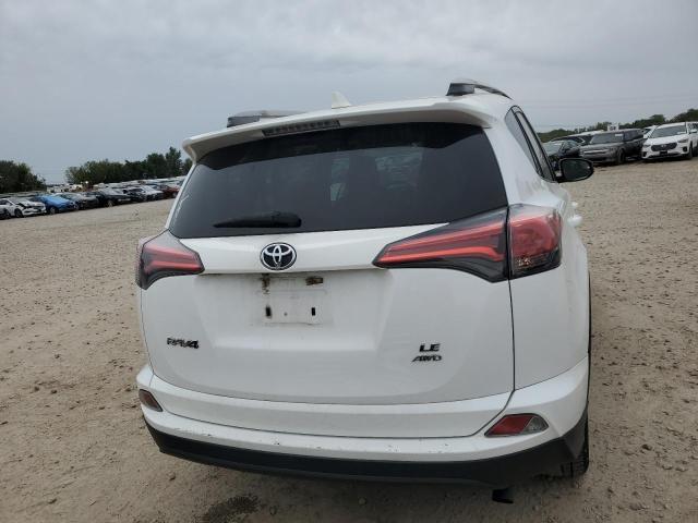 Photo 6 from auction – 2017 TOYOTA RAV4 LE with VIN 2T3BFREV8HW601180