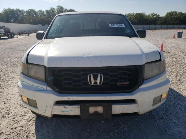 Photo 5 from auction – 2014 HONDA RIDGELINE with VIN 5FPYK1F79EB010257